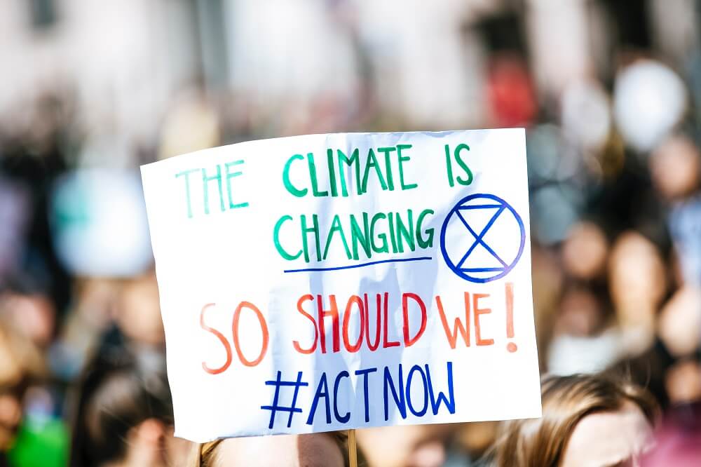 Schild The climate is changing - so should we